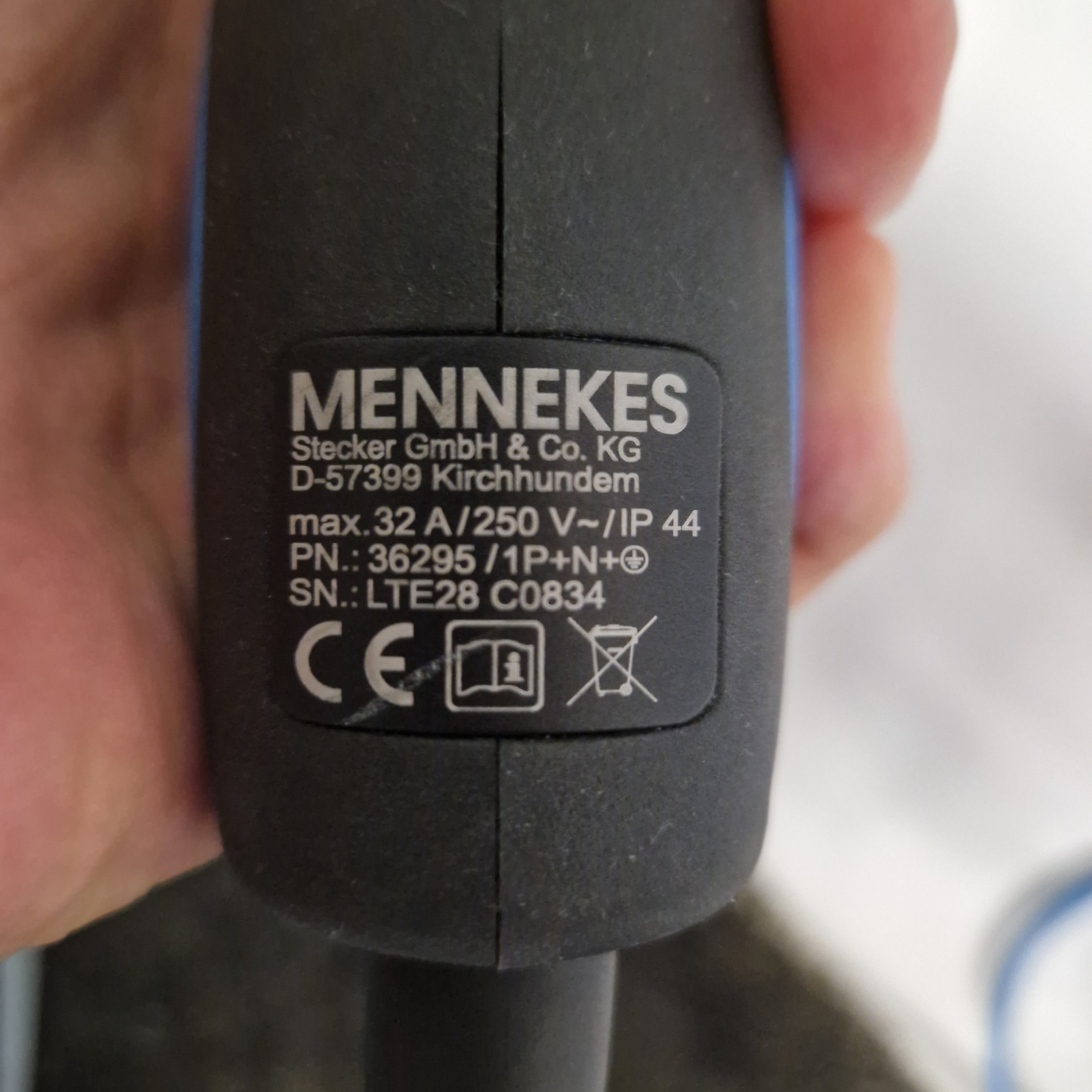 The manufacturer's label on the handle of the charging cable