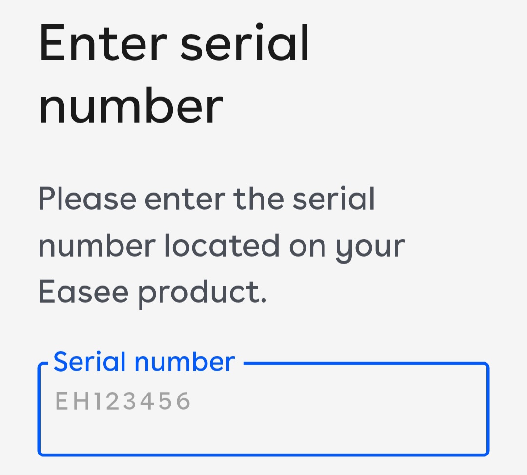 Appen som viser feltet, nå med en blå linje rundt for å vise at det er aktivt. Et eksempel på serienummer vises i inntastingsfeltet i lys grå.
