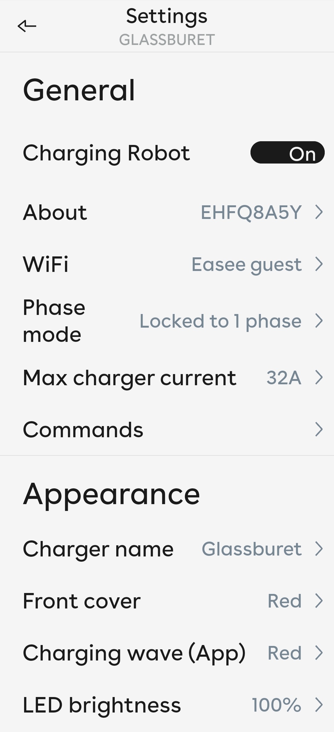 The main charger settings page, titled About