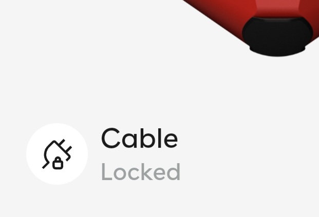 The cable lock icon on the charger card. It says Locked and it is grey.